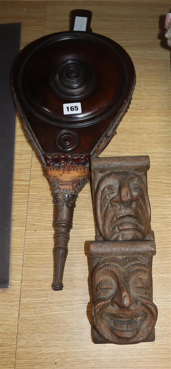 A 19th century set of mahogany bellows and a pair of carved corbels